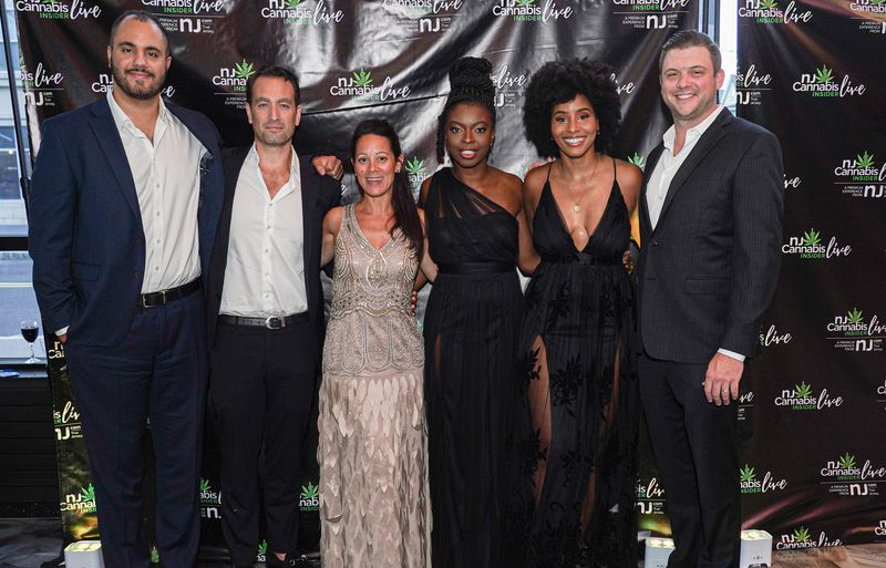 Firm Associate Mohamed Hegazi (left), Firm Partner Abraham Lichy (second from left) and Cannabis Practice Group Chair Mollie Hartman Lustig (third from left) pose for photos at the first NJ Cannabis Insider Awards Gala.